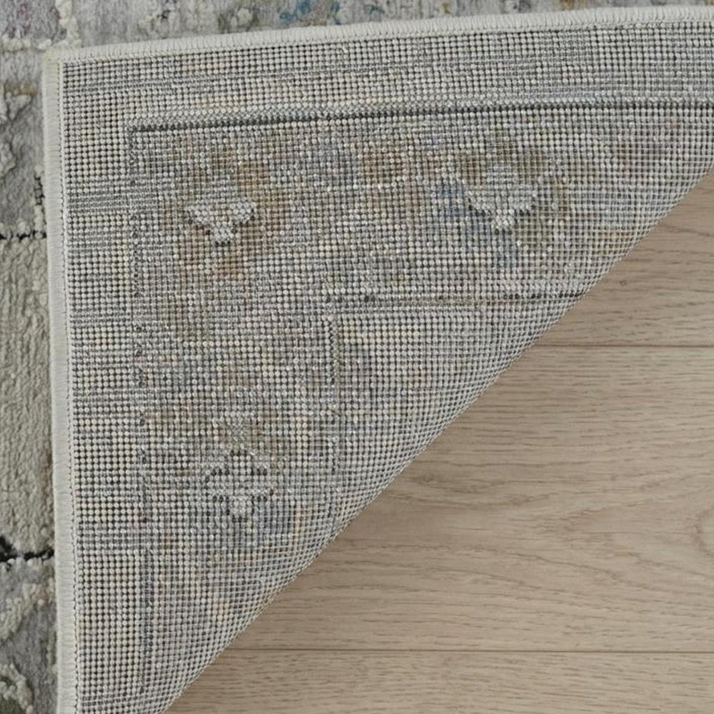 7' X 10' Cream and Beige Abstract Distressed Area Rug