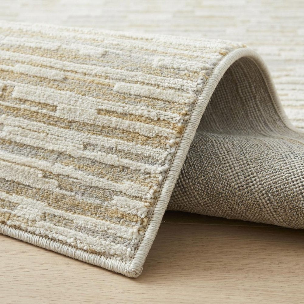 5' X 8' Beige and Brown Abstract Distressed Area Rug
