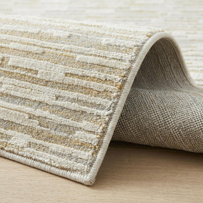 5' X 8' Beige and Brown Abstract Distressed Area Rug