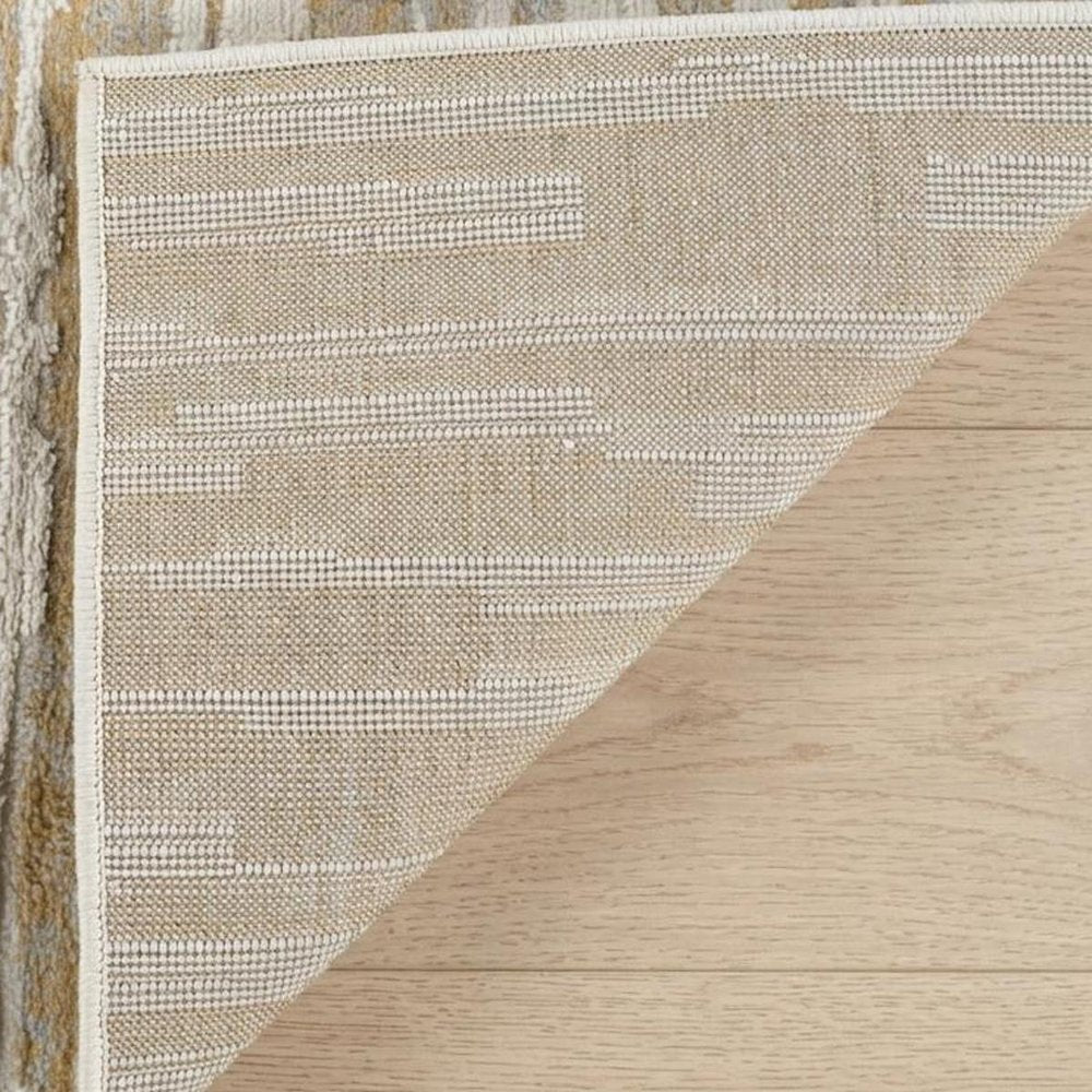 5' X 8' Beige and Brown Abstract Distressed Area Rug