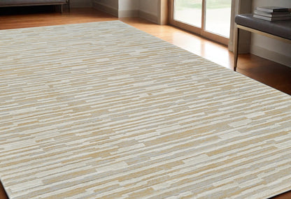 5' X 8' Beige and Brown Abstract Distressed Area Rug