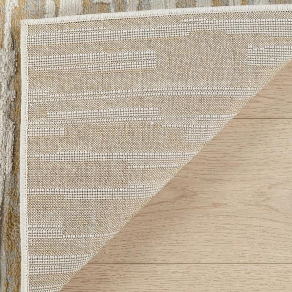 7' X 10' Beige and Brown Abstract Distressed Area Rug