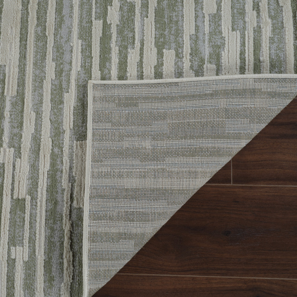 4' X 6' Beige and Green Abstract Distressed Area Rug