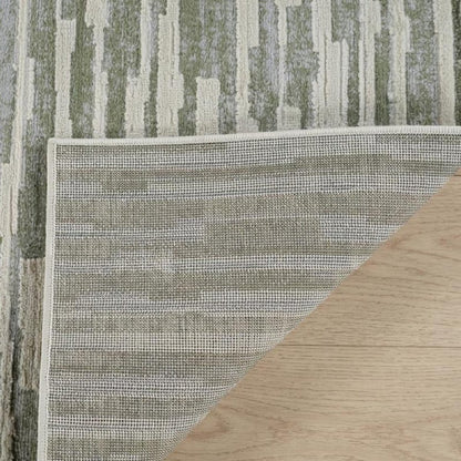 4' X 6' Beige and Green Abstract Distressed Area Rug