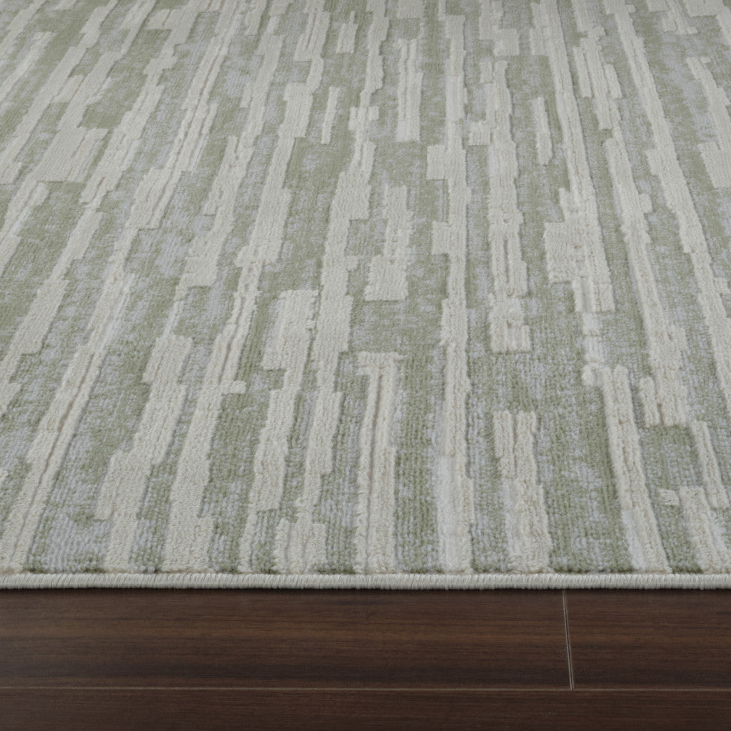 5' X 8' Beige and Green Abstract Distressed Area Rug