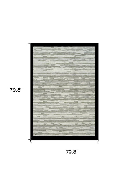 7' X 10' Beige and Green Abstract Distressed Area Rug