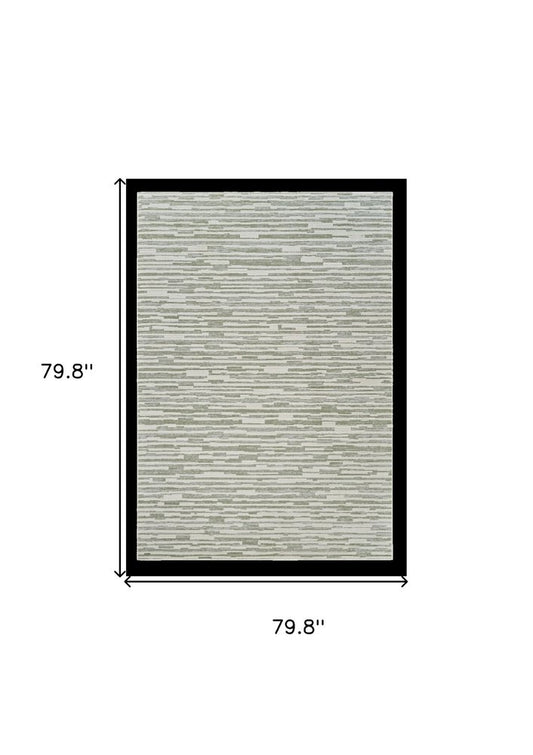 7' X 10' Beige and Green Abstract Distressed Area Rug