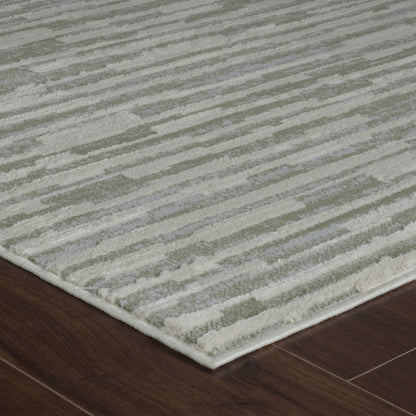 7' X 10' Beige and Green Abstract Distressed Area Rug