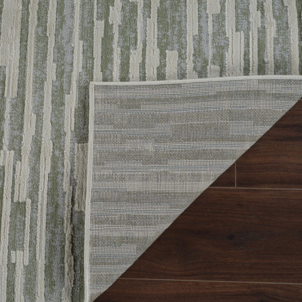 7' X 10' Beige and Green Abstract Distressed Area Rug