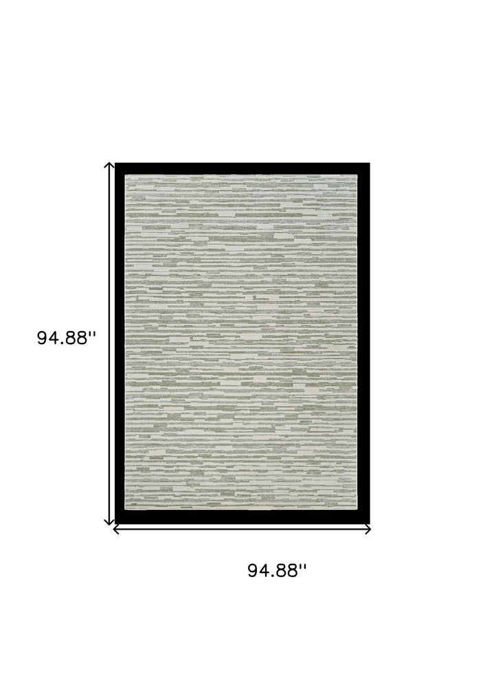 8' X 11' Beige and Green Abstract Distressed Area Rug
