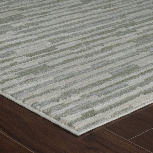 8' X 11' Beige and Green Abstract Distressed Area Rug