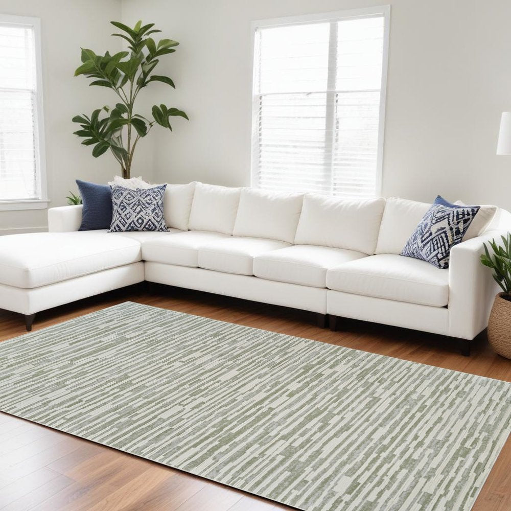 8' X 11' Beige and Green Abstract Distressed Area Rug