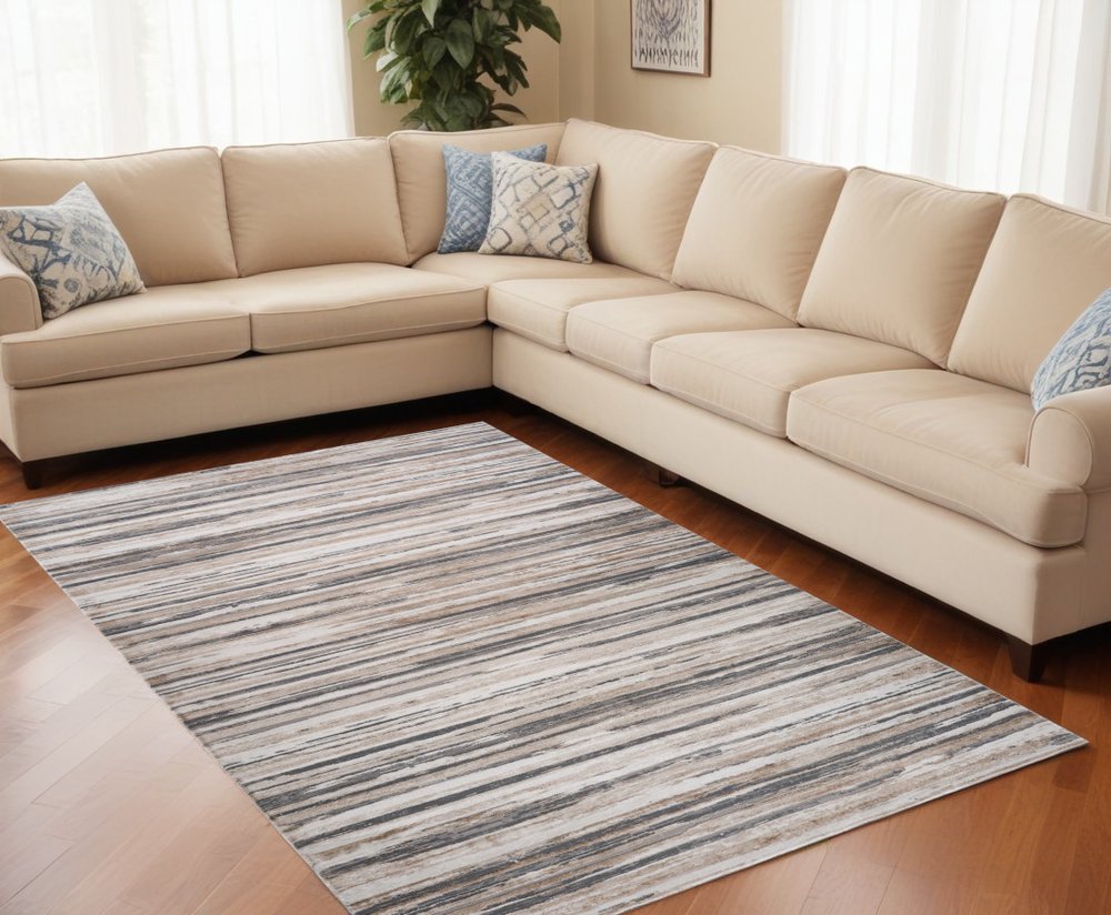 5' X 8' Beige and Gray Abstract Distressed Area Rug