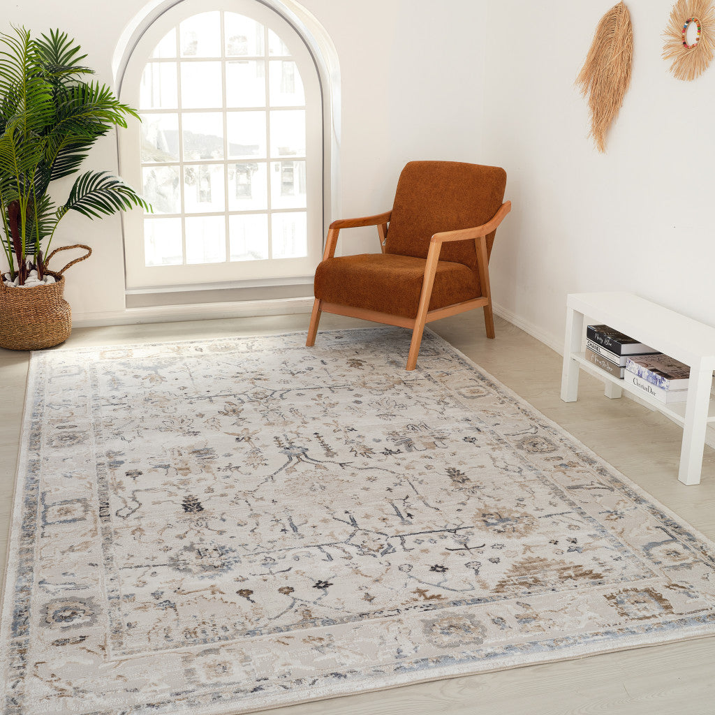 4' X 6' Beige and Ivory Abstract Distressed Area Rug