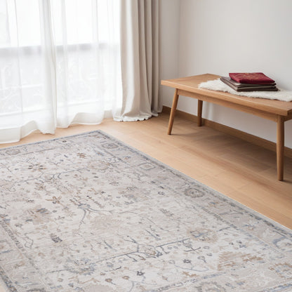 5' X 8' Beige and Ivory Abstract Distressed Area Rug