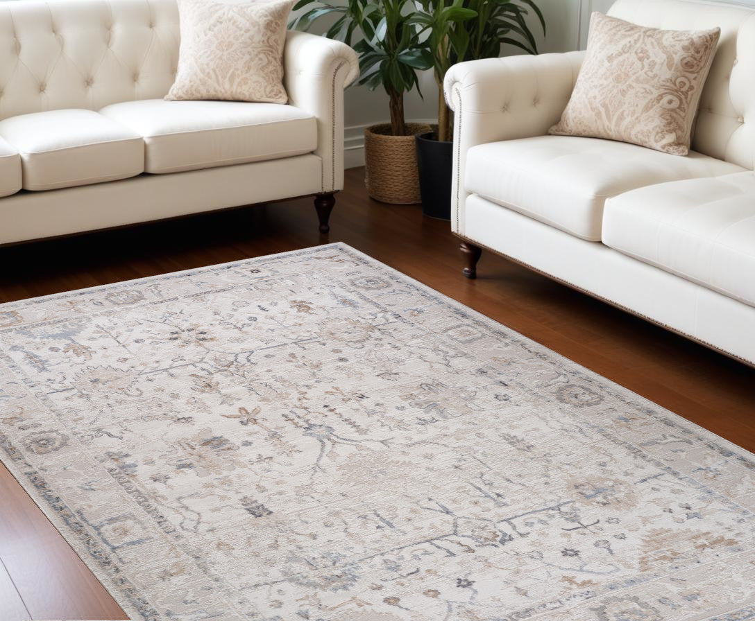 7' X 10' Beige and Ivory Abstract Distressed Area Rug