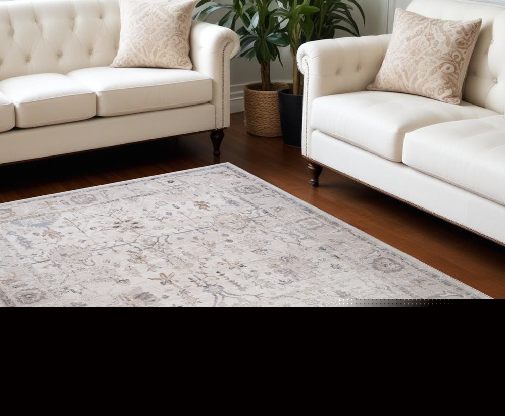 7' X 10' Beige and Ivory Abstract Distressed Area Rug