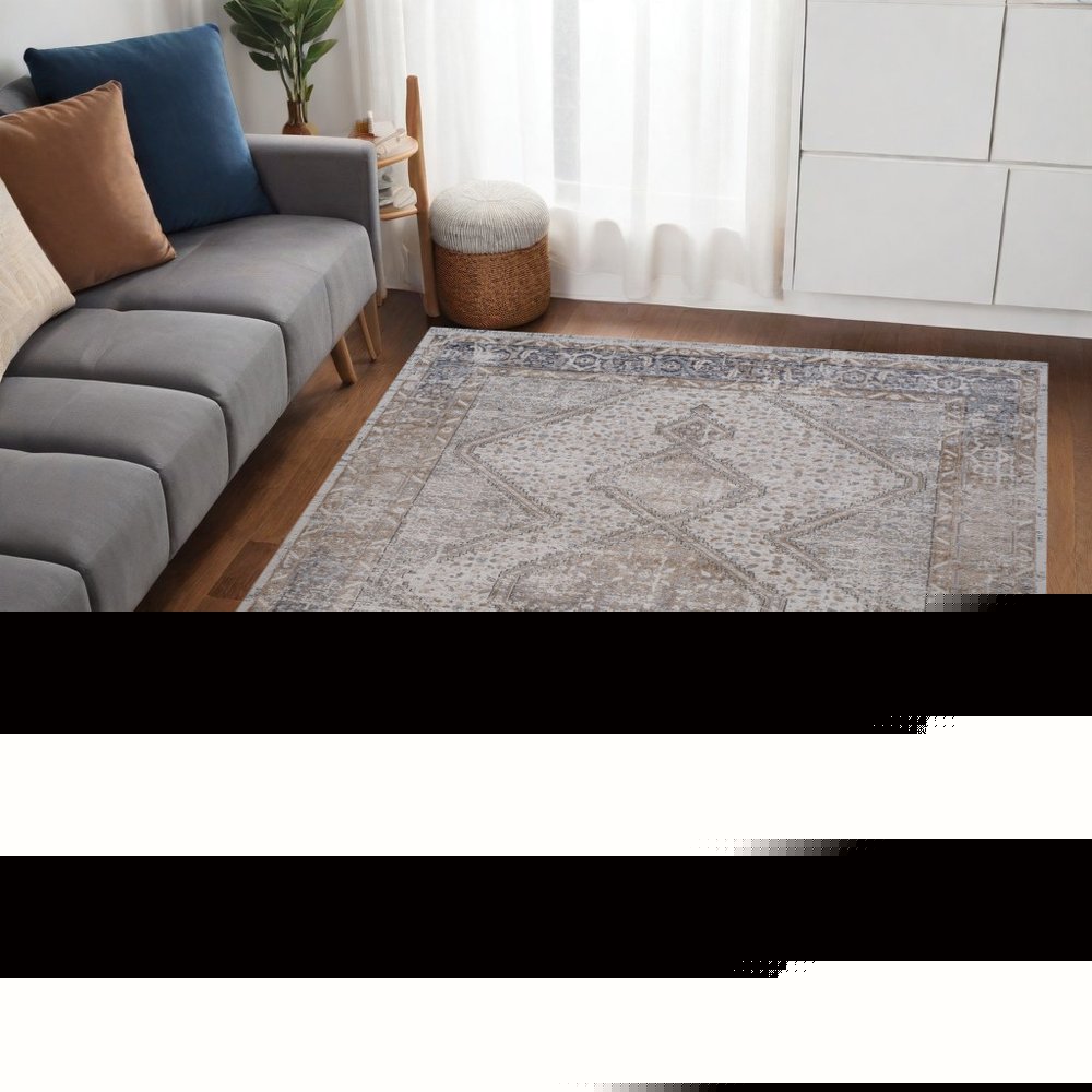 5' X 8' Beige and Gray Abstract Distressed Area Rug