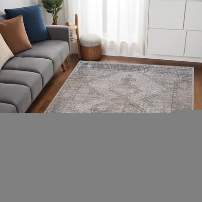5' X 8' Beige and Gray Abstract Distressed Area Rug