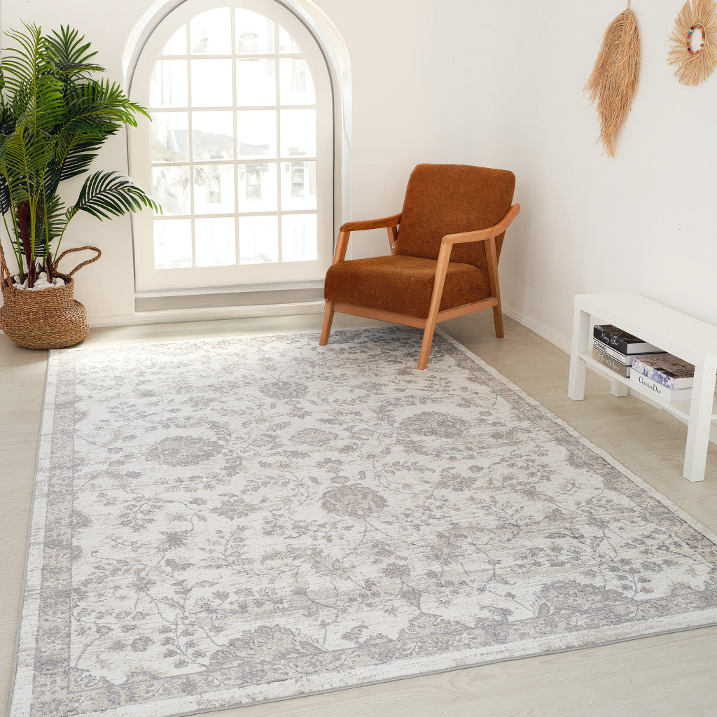 4' X 6' Beige and Gray Floral Distressed Area Rug