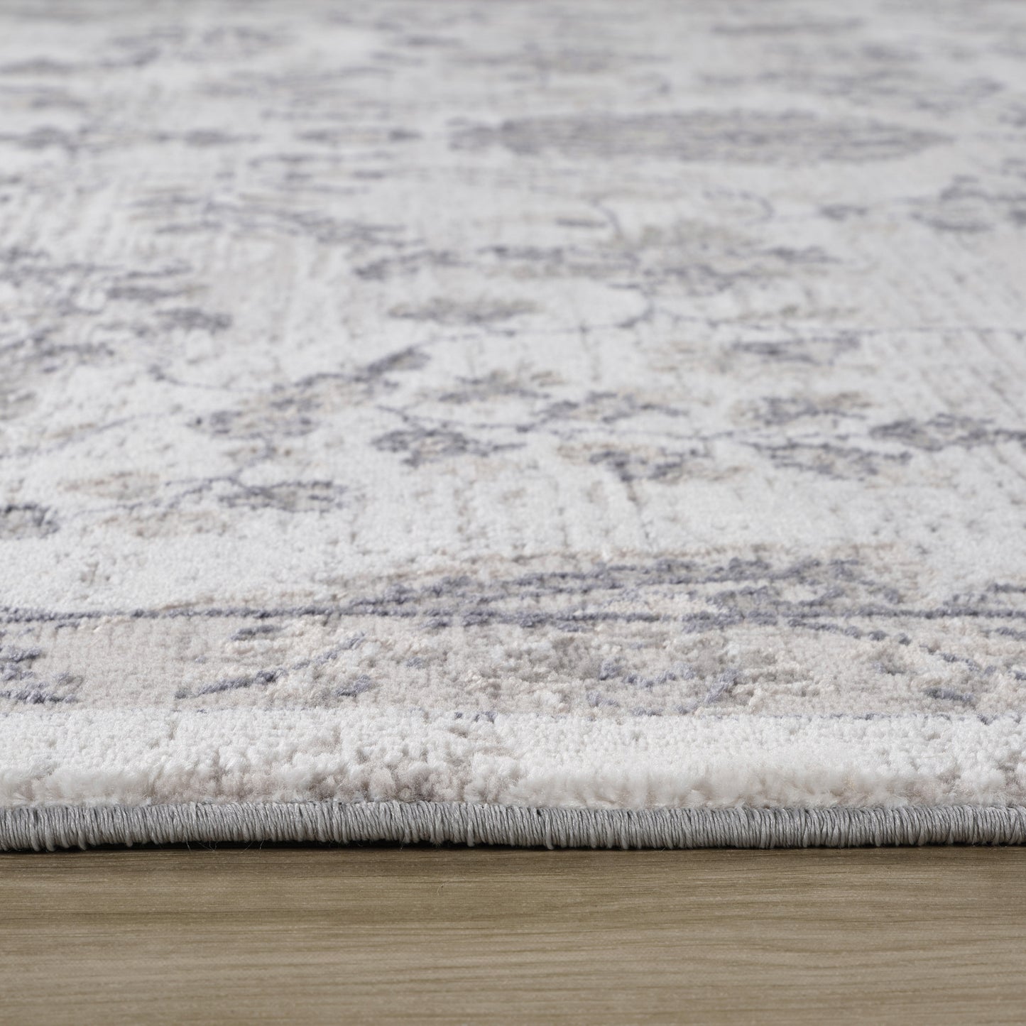 4' X 6' Beige and Gray Floral Distressed Area Rug