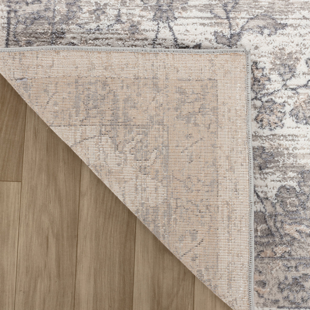 4' X 6' Beige and Gray Floral Distressed Area Rug