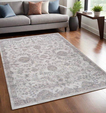 5' X 8' Beige and Gray Floral Distressed Area Rug