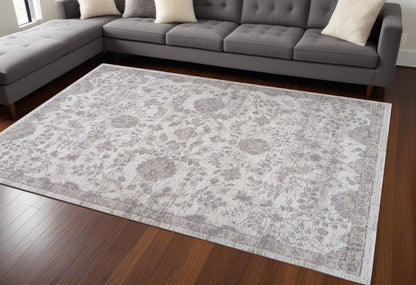 7' X 10' Beige and Gray Floral Distressed Area Rug