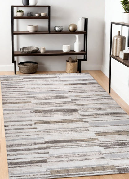 4' X 6' Beige and Brown Abstract Distressed Area Rug
