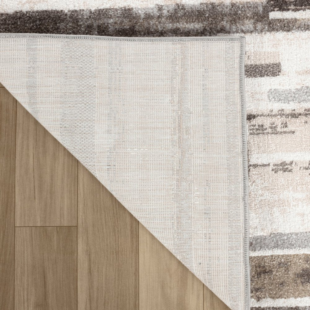 7' X 10' Beige and Brown Abstract Distressed Area Rug