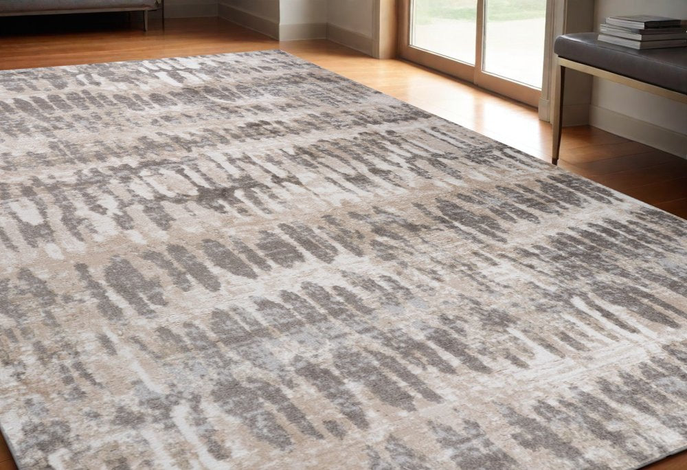 5' X 8' Beige and Brown Abstract Distressed Area Rug