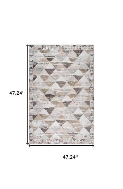 4' X 6' Beige and Brown Abstract Distressed Area Rug