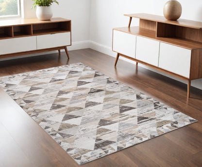 4' X 6' Beige and Brown Abstract Distressed Area Rug