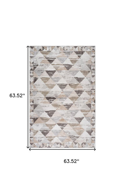 5' X 8' Beige and Brown Abstract Distressed Area Rug