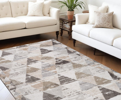 7' X 10' Beige and Brown Abstract Distressed Area Rug