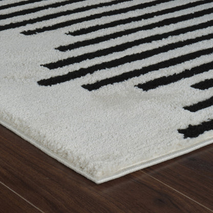 4' X 6' Cream and Black Abstract Distressed Area Rug