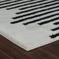 8' X 11' Cream and Black Abstract Distressed Area Rug