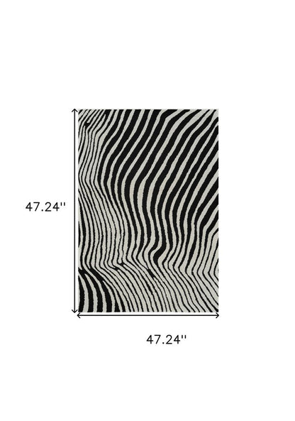 4' X 6' Cream and Black Abstract Distressed Area Rug