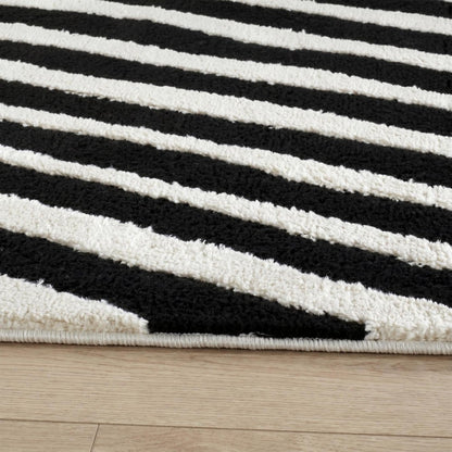 4' X 6' Cream and Black Abstract Distressed Area Rug