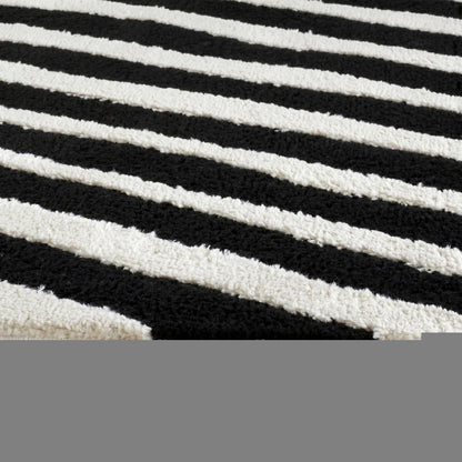 5' X 8' Cream and Black Abstract Distressed Area Rug