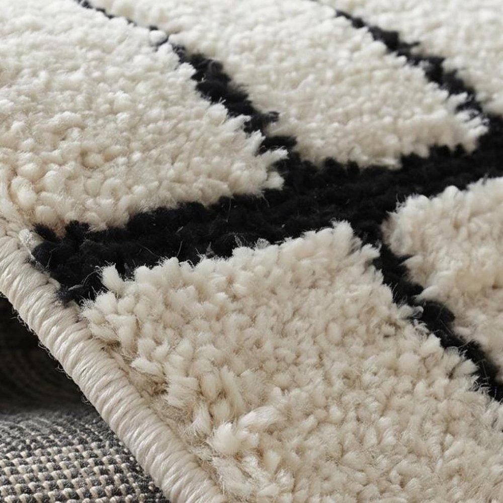 4' X 6' Cream and Black Abstract Distressed Area Rug
