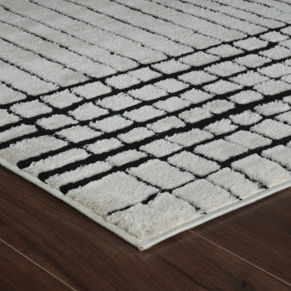 4' X 6' Cream and Black Abstract Distressed Area Rug