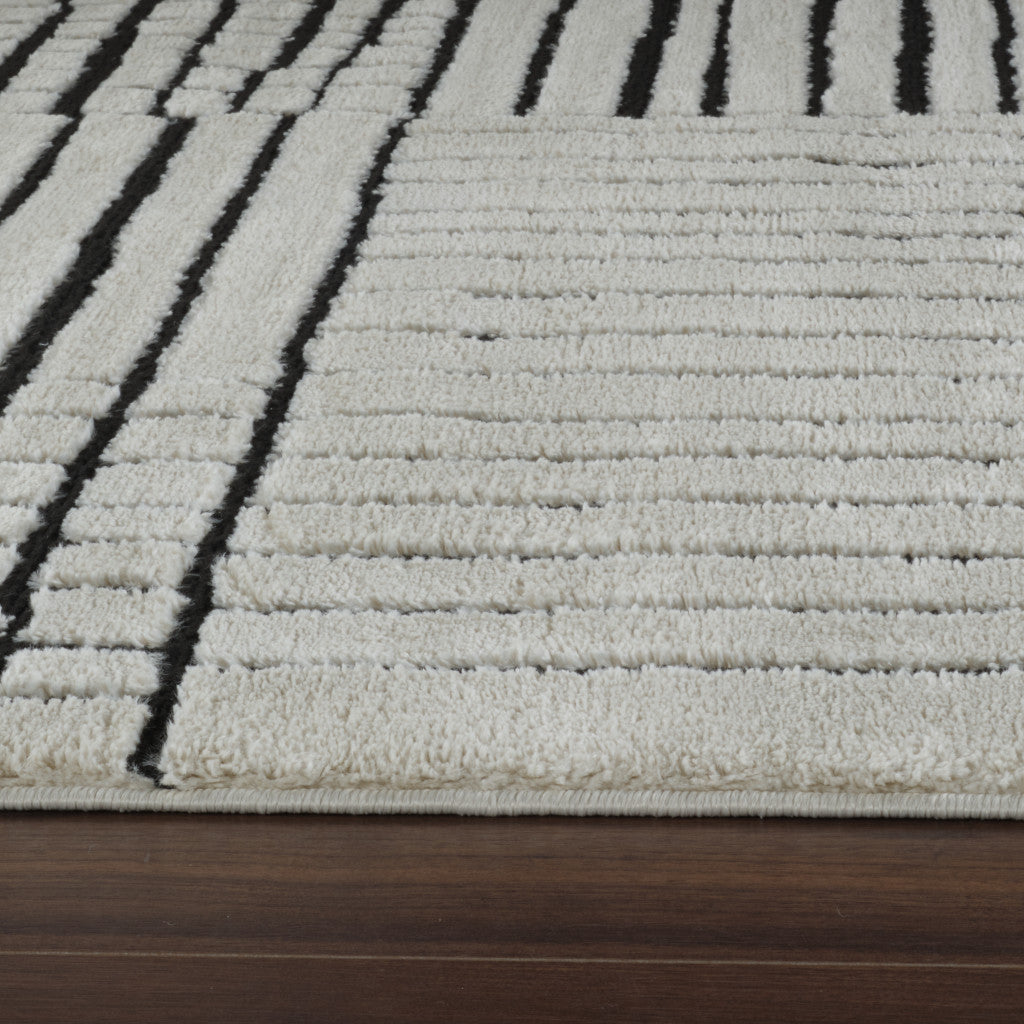 4' X 6' Cream and Black Abstract Distressed Area Rug