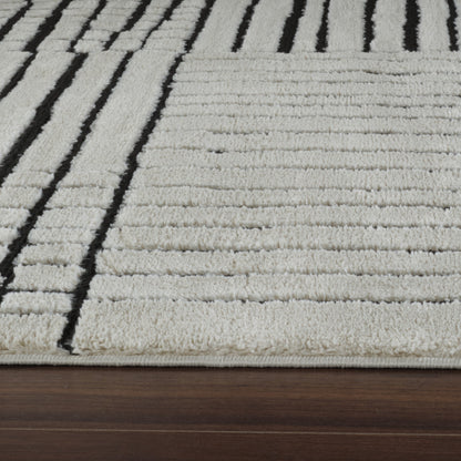 4' X 6' Cream and Black Abstract Distressed Area Rug