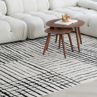 4' X 6' Cream and Black Abstract Distressed Area Rug