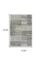 4' X 6' Cream and Black Abstract Distressed Area Rug