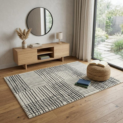 4' X 6' Cream and Black Abstract Distressed Area Rug