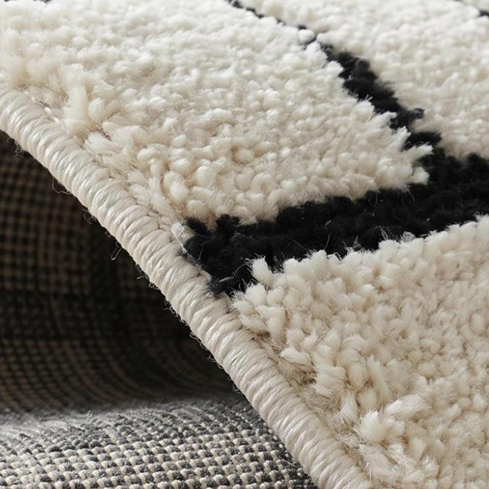 4' X 6' Cream and Black Abstract Distressed Area Rug