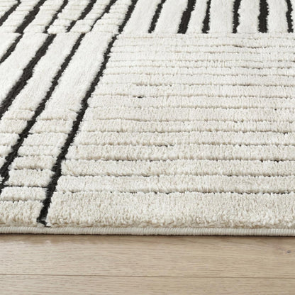 7' X 10' Cream and Black Abstract Distressed Area Rug