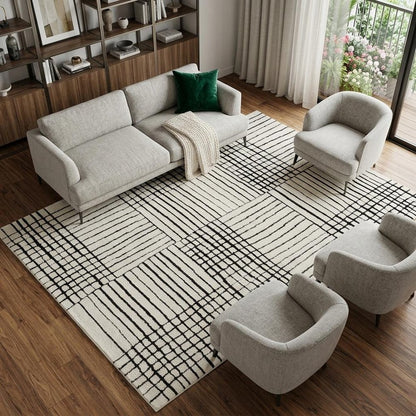7' X 10' Cream and Black Abstract Distressed Area Rug